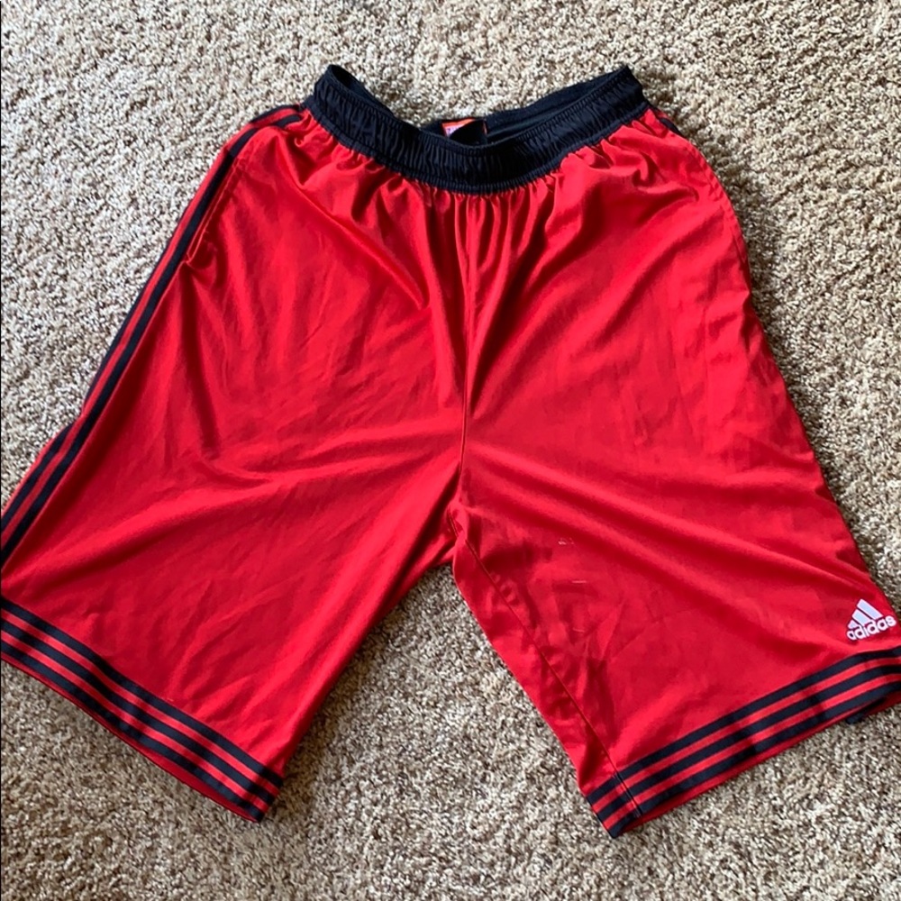 Men’s Medium red and black Basketball shorts